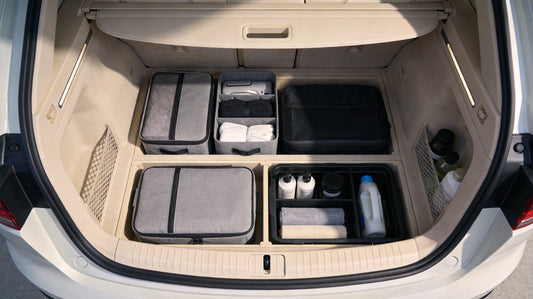 Pristine clean car trunk with neatly organized storage containers